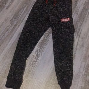 I am selling these black and sort of red sweats